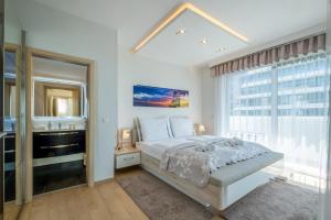 Posteľ alebo postele v izbe v ubytovaní MyFlat Casa Luxury Apartment