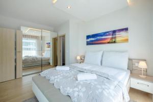 Posteľ alebo postele v izbe v ubytovaní MyFlat Casa Luxury Apartment