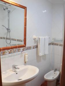 Koupelna v ubytování Hotel Pugide