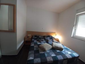 Postel nebo postele na pokoji v ubytování Villa Marija