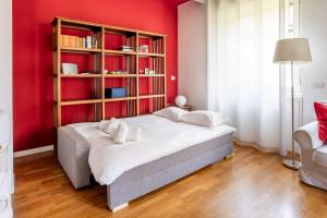 Postel nebo postele na pokoji v ubytování Ospedale Niguarda - Privacy in Apt con terrazza