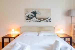 Postel nebo postele na pokoji v ubytování Ospedale Niguarda - Privacy in Apt con terrazza