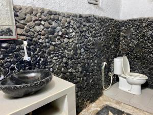 Koupelna v ubytování Zoé Bungalows + 37 fotografií