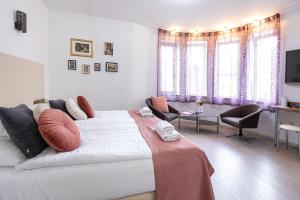 Posteľ alebo postele v izbe v ubytovaní Csillag Villa