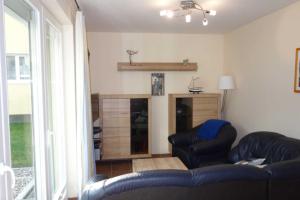 Posezení v ubytování Ferienwohnung Morgenröte in der Strandstraße