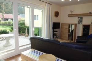 Posezení v ubytování Ferienwohnung Morgenröte in der Strandstraße + 14 fotografií