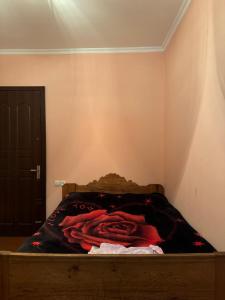 A bed or beds in a room at Vodo's Guesthouse
