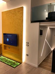 TV a/nebo společenská místnost v ubytování Rent Room 5 Rolandi Apartaments