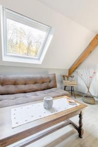 Posezení v ubytování AUX 2 LACS chambres d'hôtes