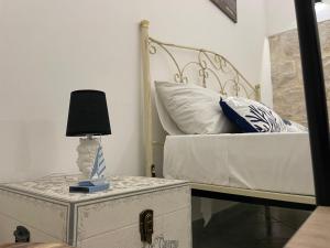Postel nebo postele na pokoji v ubytování Luisa Room