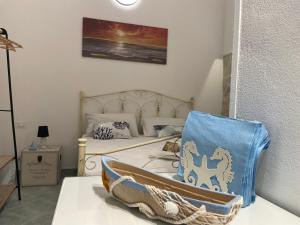 Rúm í herbergi á Luisa Room