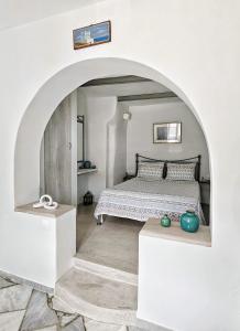 Postel nebo postele na pokoji v ubytování Tinoshomelidays Residences