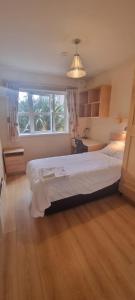 Ένα ή περισσότερα κρεβάτια σε δωμάτιο στο StaySligo Rooms