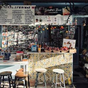 a store with stools in front of a counter at auntythong house in Bangkok +29 photos