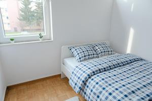 Posteľ alebo postele v izbe v ubytovaní Wow Rooms