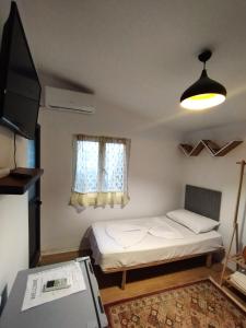 Postel nebo postele na pokoji v ubytování 2 single Bedroom Tirana