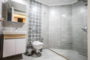 Koupelna v ubytování M2 Hotel