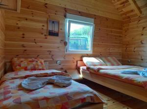 Katil atau katil-katil dalam bilik di Eco Village Mojkovac +43 gambar