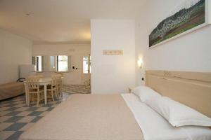 Postel nebo postele na pokoji v ubytování HOTEL SoleMare Gallipoli + 37 fotografií