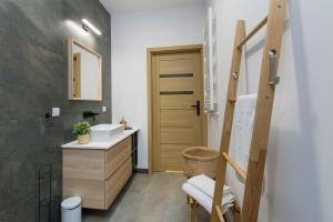 Kúpeľňa v ubytovaní Bursztynowe Tarasy - Apartamenty