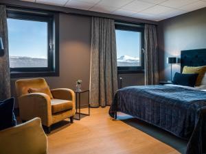 Postel nebo postele na pokoji v ubytování Quality Hotel Grand Royal