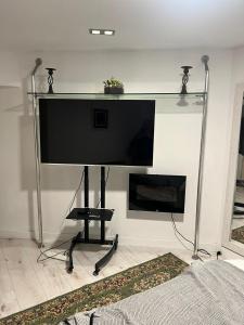A television and/or entertainment centre at Loft la Matanza
