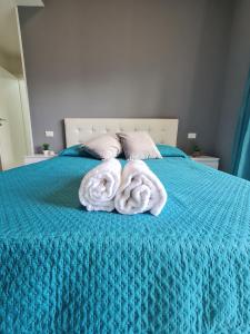 Postel nebo postele na pokoji v ubytování Alma Suite Bed and Breakfast