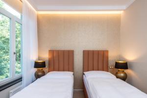 Voodi või voodid majutusasutuse PAPPAS hotel&studio toas