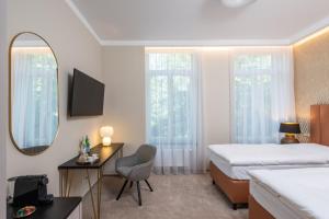 Voodi või voodid majutusasutuse PAPPAS hotel&studio toas