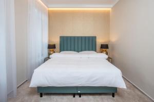 Voodi või voodid majutusasutuse PAPPAS hotel&studio toas