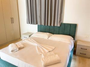 Postel nebo postele na pokoji v ubytování PineSide Rooms