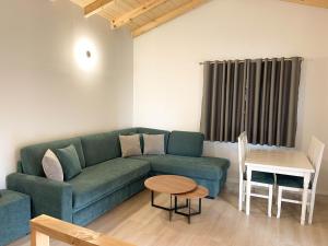 Posezení v ubytování PineSide Rooms