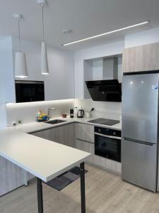 Køkken eller tekøkken på SeaView 2 - Sunset Suite Experience