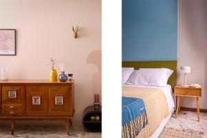 a bedroom with a bed and a wooden dresser at Gigi' Studio in Verona