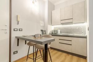 A kitchen or kitchenette at MM Pozzo Strada Mini Subway Studio