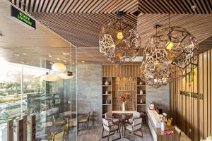 Posezení v ubytování Hoàng Thịnh Hotel & Apartment Danang + 37 fotografií
