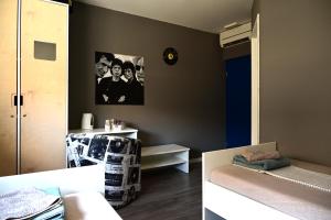 Postel nebo postele na pokoji v ubytování Rock Rooms Pula