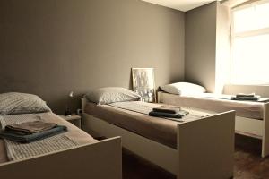 Postel nebo postele na pokoji v ubytování Rock Rooms Pula