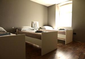 Postel nebo postele na pokoji v ubytování Rock Rooms Pula