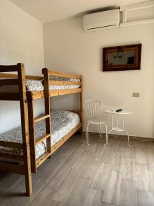 Ένα ή περισσότερα κρεβάτια σε δωμάτιο στο Agriturismo Le Grange