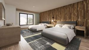 Embassy Suites by Hilton Napa Valley客房内的一张或多张床位