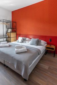 Posteľ alebo postele v izbe v ubytovaní Hotel Radosti