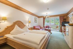 Voodi või voodid majutusasutuse Hotel Post toas