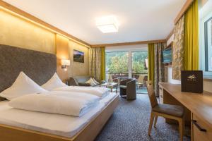 Voodi või voodid majutusasutuse Hotel Post toas