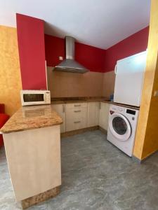 Kuchyň nebo kuchyňský kout v ubytování Apartamento Studio
