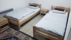 Postel nebo postele na pokoji v ubytování Prenoćište 3 sobe + 20 fotografií