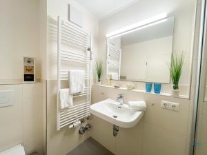 Koupelna v ubytování Urlaub in 1. Strandreihe