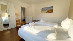 Ένα ή περισσότερα κρεβάτια σε δωμάτιο στο Ferienhaus James