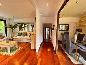 a living room with a couch and a table at Casa rural y moderna in Hondarribia