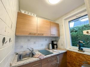 Kuchyň nebo kuchyňský kout v ubytování Ferienhaus Seepferdchen Duhnen